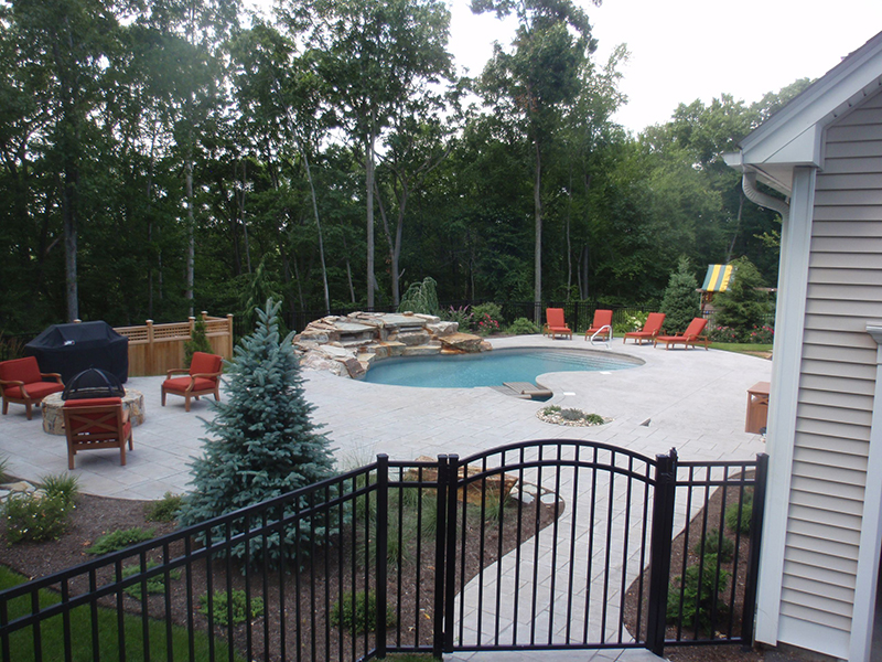 Swimming pool and stamped concrete project example 23